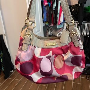Multicolor authentic Coach handbag with center zip compartment